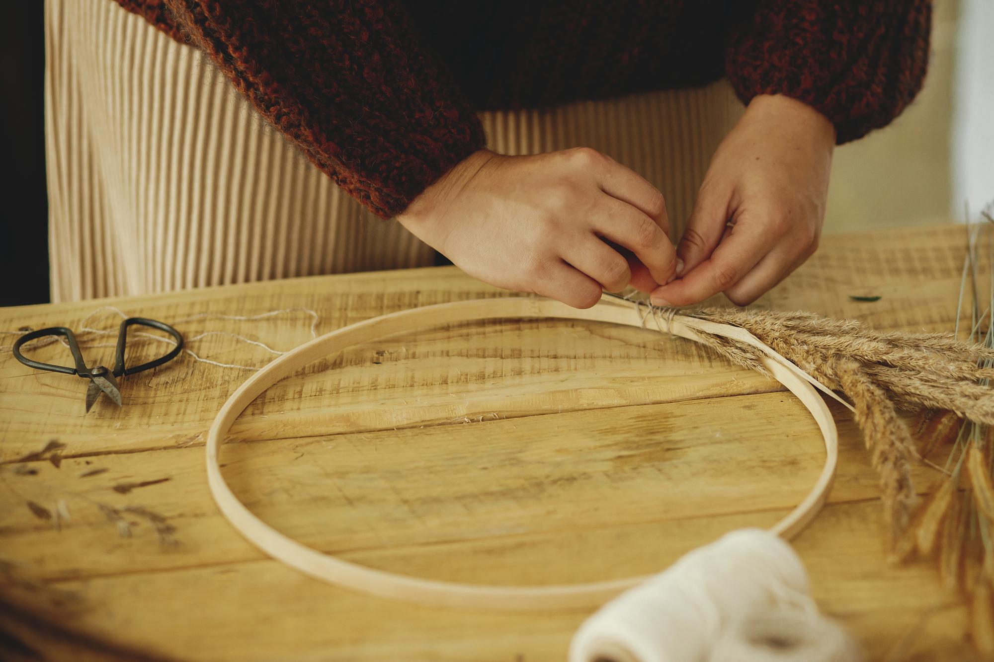 Workshop hands at hoop